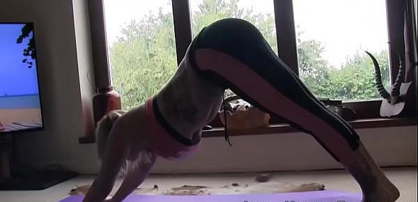  Inked busty yoga brit in spandex